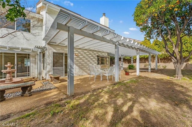 view of patio featuring a pergola