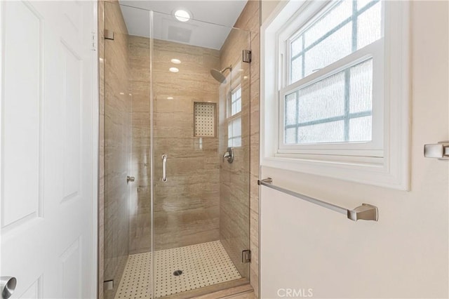 bathroom with an enclosed shower