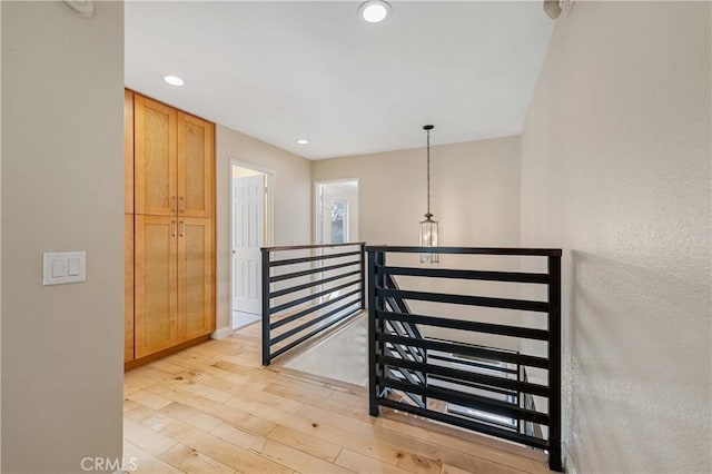 hall with light wood-type flooring