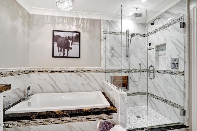 bathroom featuring crown molding and shower with separate bathtub