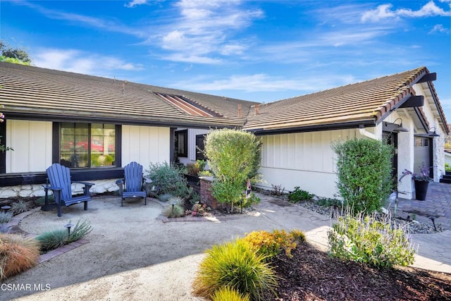 view of front of house with a patio