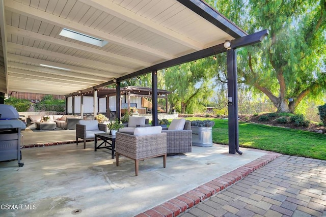 view of patio with a pergola and outdoor lounge area