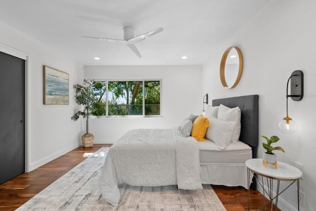 bedroom featuring ceiling fan and wood-type flooring