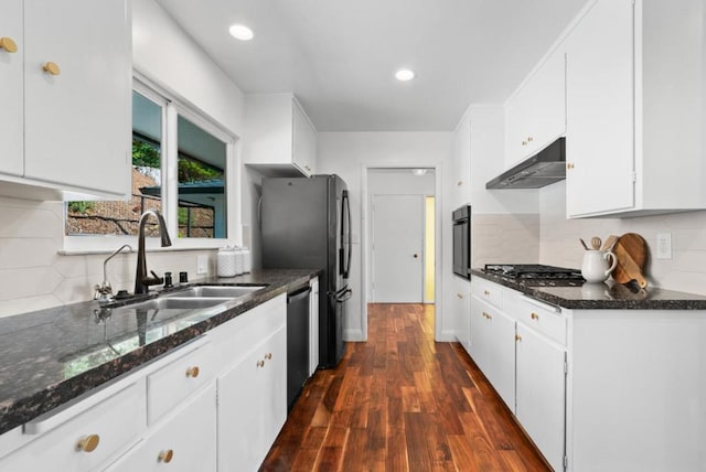 kitchen featuring sink, white cabinets, dark hardwood / wood-style floors, and stainless steel appliances