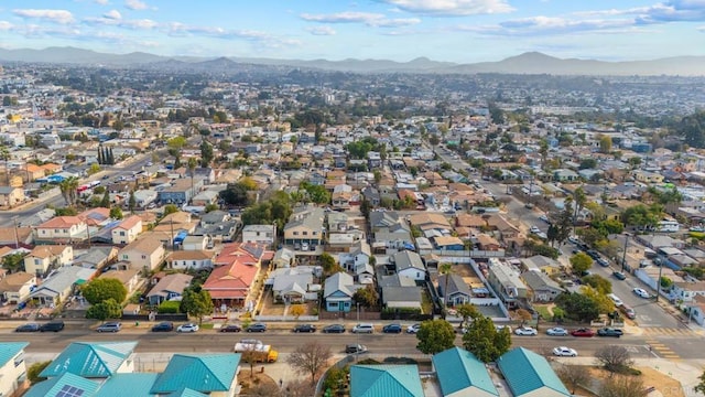 drone / aerial view featuring a mountain view