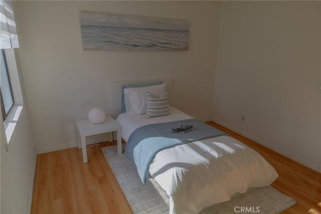 bedroom featuring light hardwood / wood-style flooring