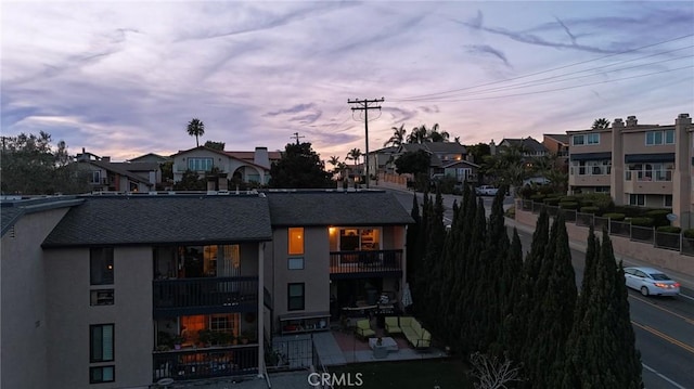 view of outdoor building at dusk