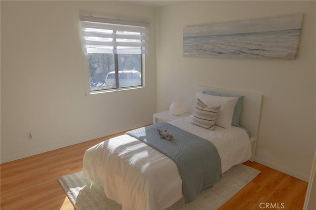 bedroom featuring light hardwood / wood-style floors