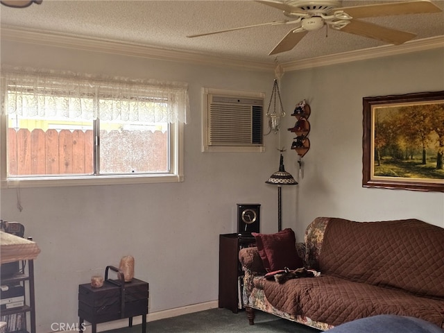 carpeted living room with ceiling fan, a textured ceiling, and crown molding