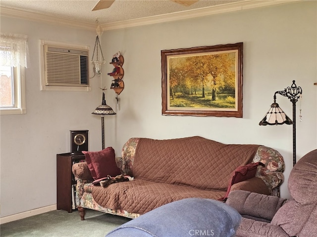 living room with carpet, ornamental molding, a wall mounted AC, and a textured ceiling