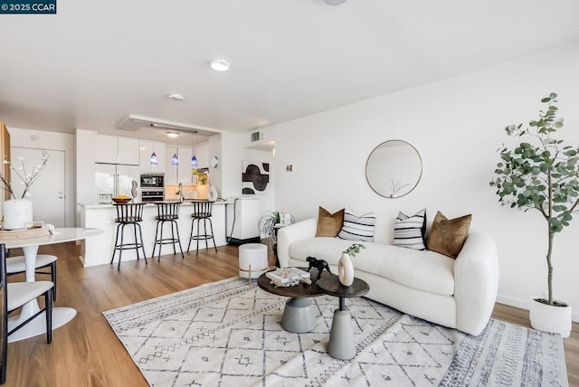 living room with light wood-type flooring