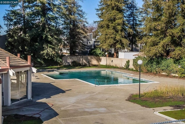 view of pool with a patio