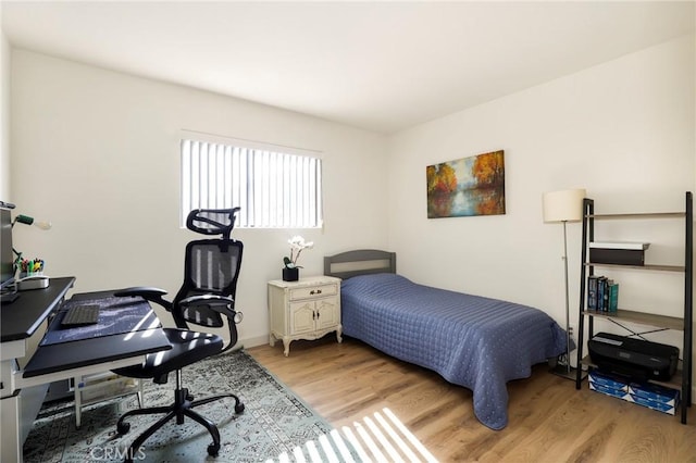 bedroom featuring light hardwood / wood-style flooring