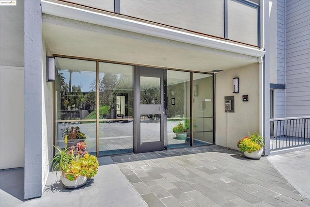 doorway to property with a patio