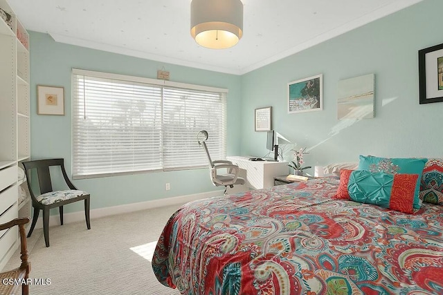 bedroom featuring light carpet and ornamental molding