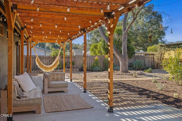 view of patio / terrace featuring a pergola and outdoor lounge area