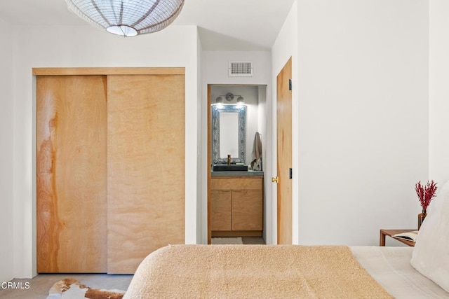 bedroom with sink