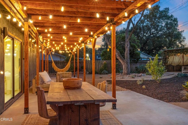 patio terrace at dusk with an outdoor fire pit