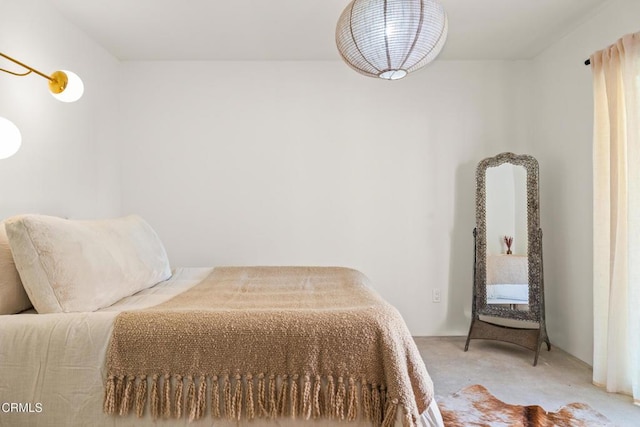 bedroom with light carpet