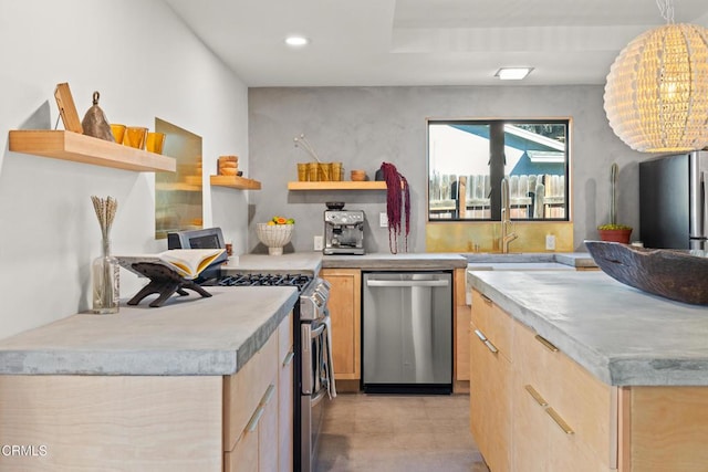 kitchen featuring light brown cabinetry, light countertops, recessed lighting, appliances with stainless steel finishes, and open shelves