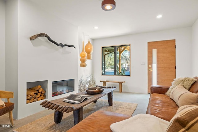 carpeted living area featuring recessed lighting