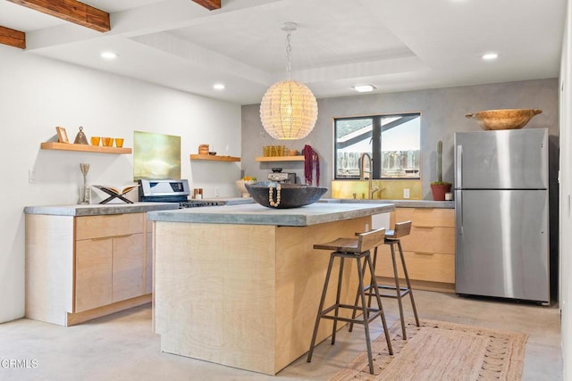 kitchen with modern cabinets, light brown cabinetry, open shelves, stainless steel appliances, and concrete flooring
