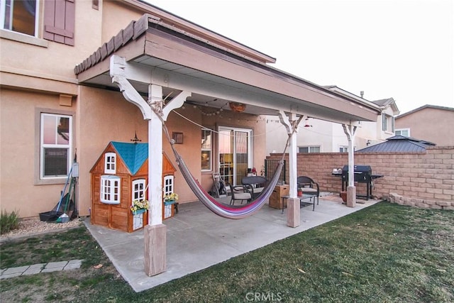 view of patio / terrace with a grill