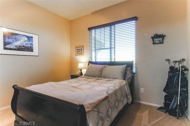 bedroom featuring carpet