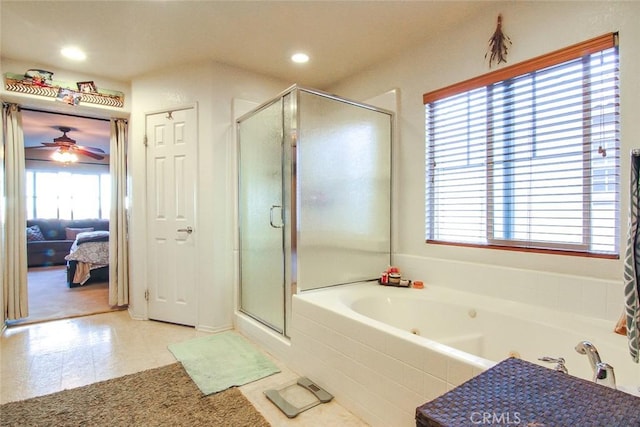 bathroom with separate shower and tub and ceiling fan