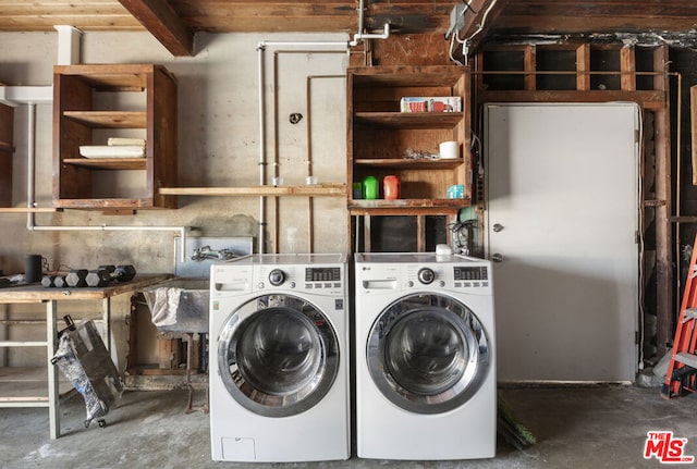 laundry area featuring sink and washer and clothes dryer