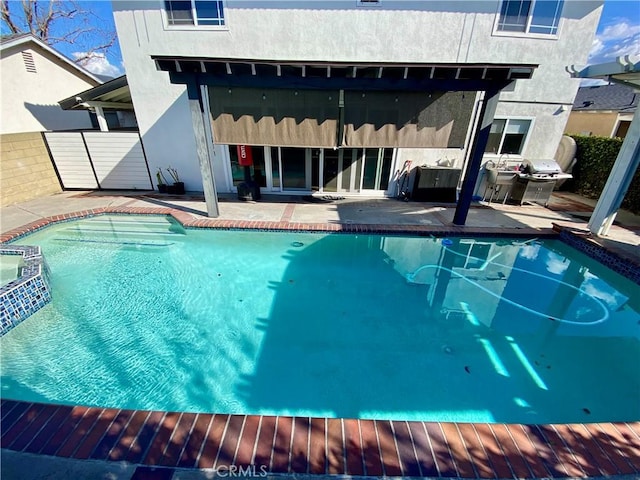 view of pool with a patio