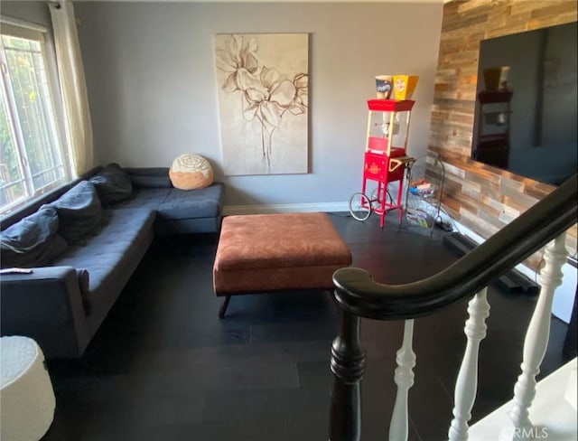 living room featuring wooden walls