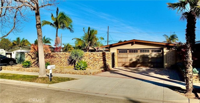 view of front facade with an attached garage and driveway