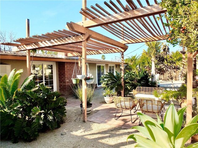 view of patio featuring a pergola