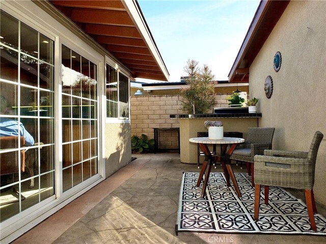 balcony with a patio area