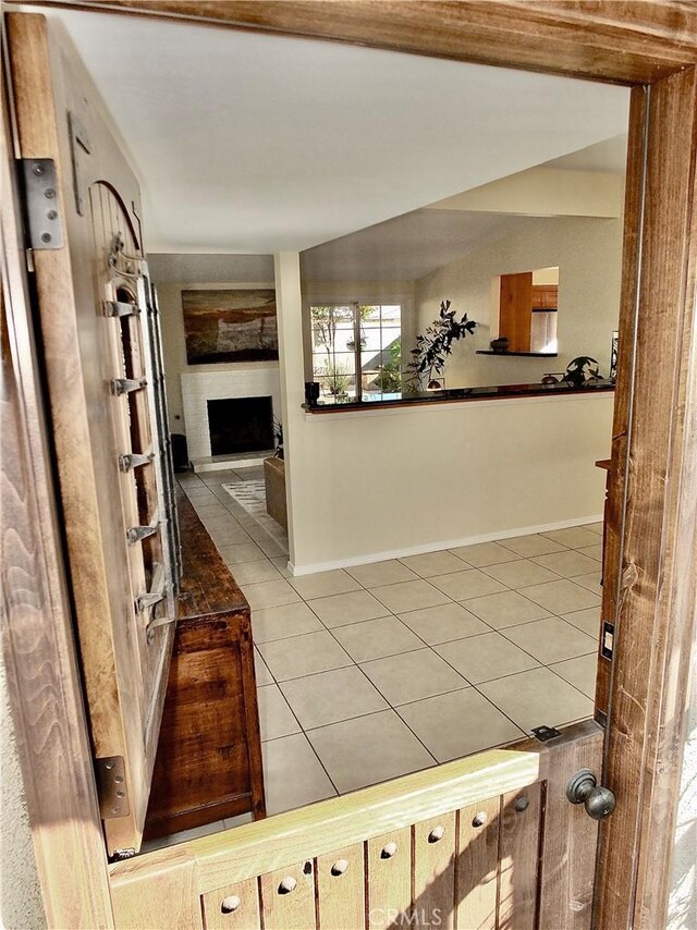 hallway with light tile patterned flooring