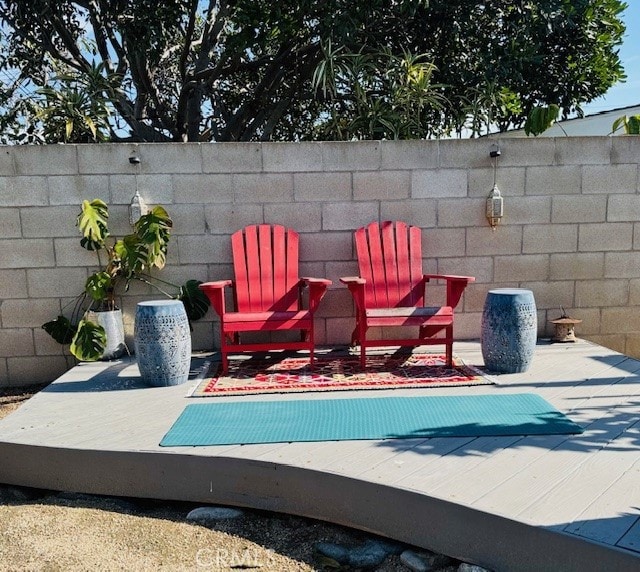 view of pool featuring a patio and fence