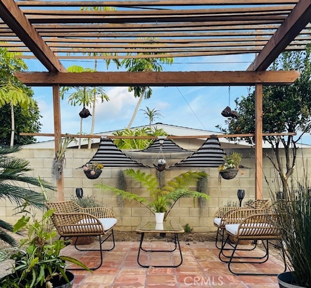 view of patio / terrace featuring a pergola