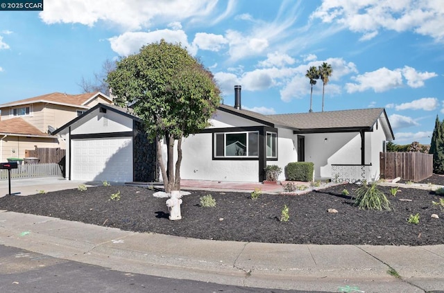 single story home with a garage