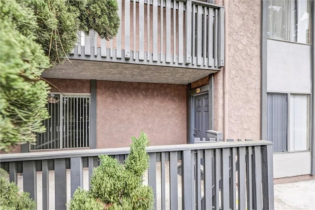 property entrance with a balcony