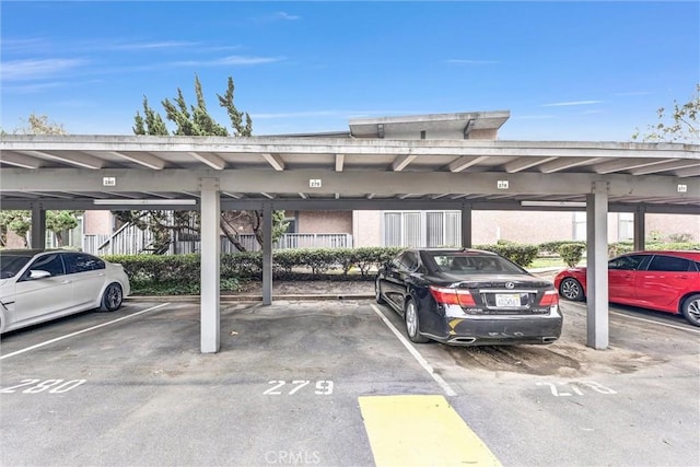 view of vehicle parking featuring a carport