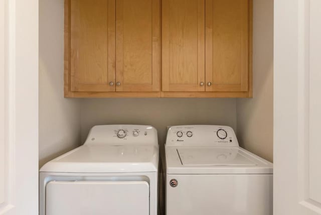 laundry room with washer and dryer