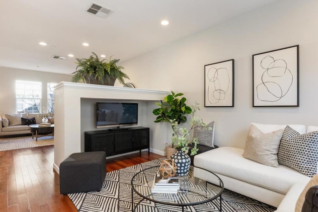 living room with dark wood-type flooring