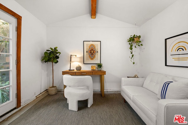 living area featuring a wealth of natural light and lofted ceiling with beams