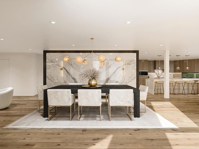 dining space with light wood-type flooring