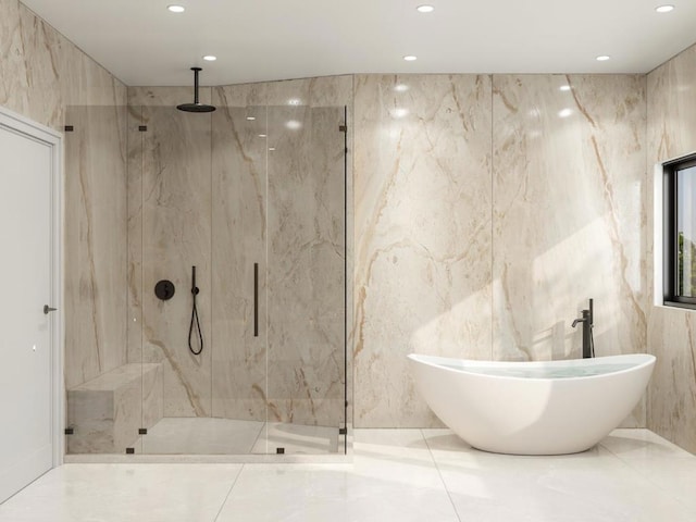 bathroom featuring tile walls and independent shower and bath