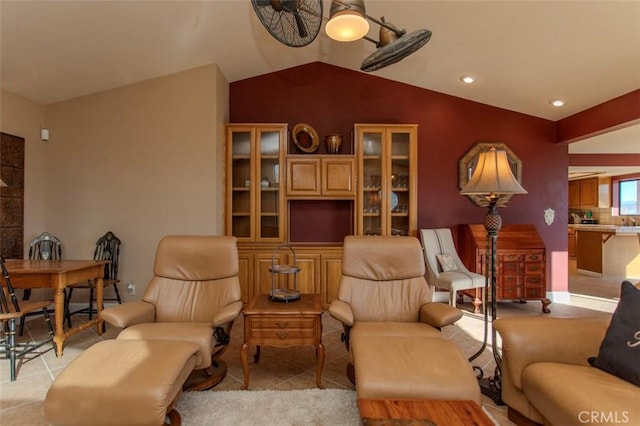 living area with vaulted ceiling