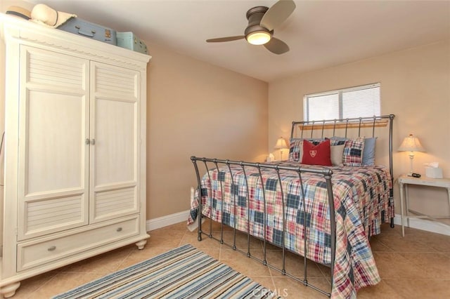 bedroom featuring ceiling fan and light tile patterned flooring