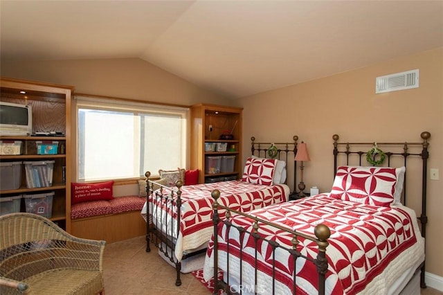 bedroom with vaulted ceiling