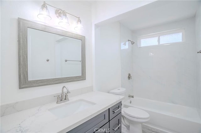 full bathroom featuring toilet, vanity, and bathtub / shower combination